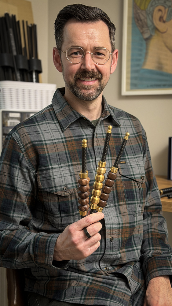 Trevor Wright, founder of Jeea Recovery, holding a Jeea Companion roller