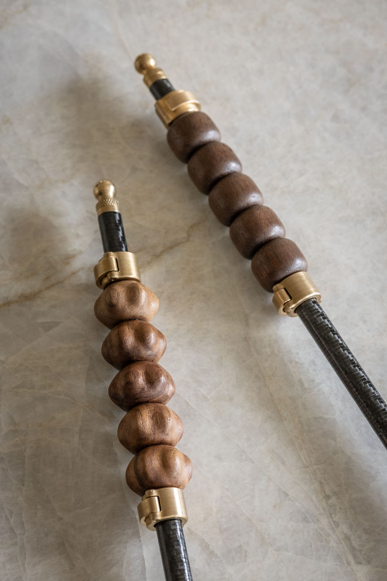 Two Companion Rollers with different bead configurations on stone
