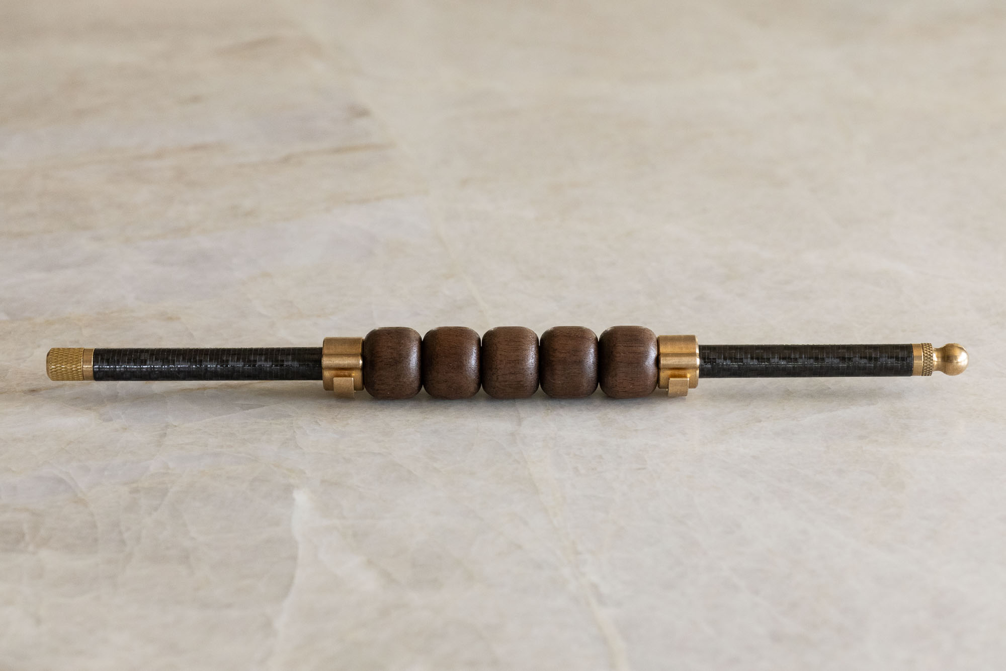 Full profile of the Companion Roller with smooth walnut beads